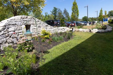 A bright green grassy garden at MaineHealth Waldo Hospital