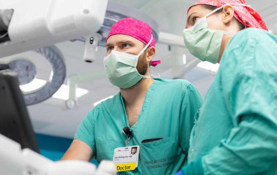 MHMMC providers look at a screen during cardiac surgery