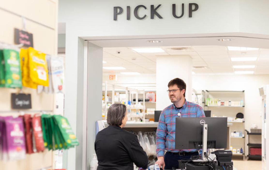 A customer speaks to a MaineHealth Pharmacy Maine Medical Center Biddeford care team member 