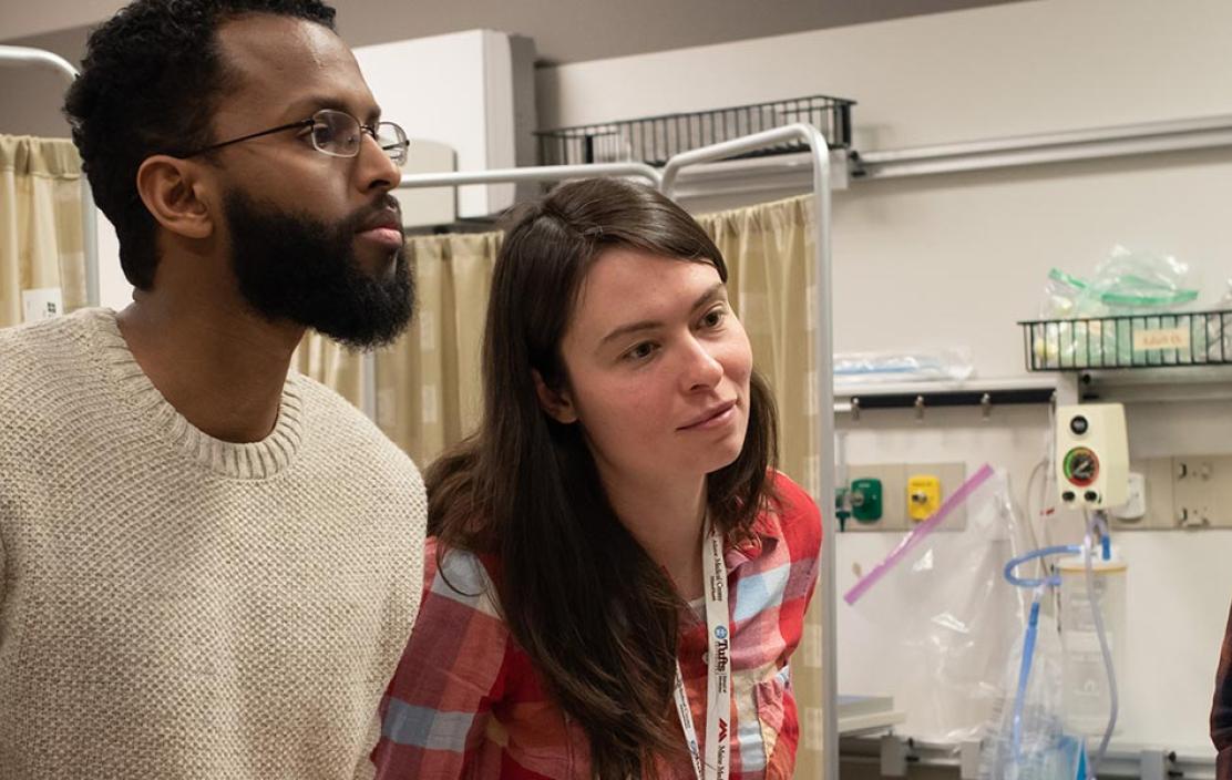 a group of diverse medical education students in a hospital setting