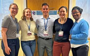 Five MaineHealth Behavioral Health Nurse Residency Program graduates stand together