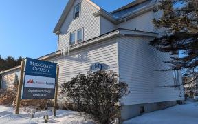 Exterior of 96 Maverick St in Rockland with main entrance sign