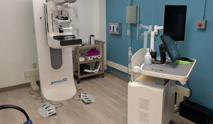A mammography machine in a medical exam room