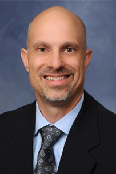 A headshot of Joe Grant