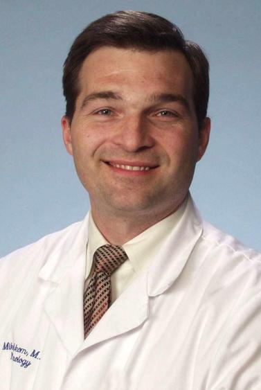 Michael C Akom